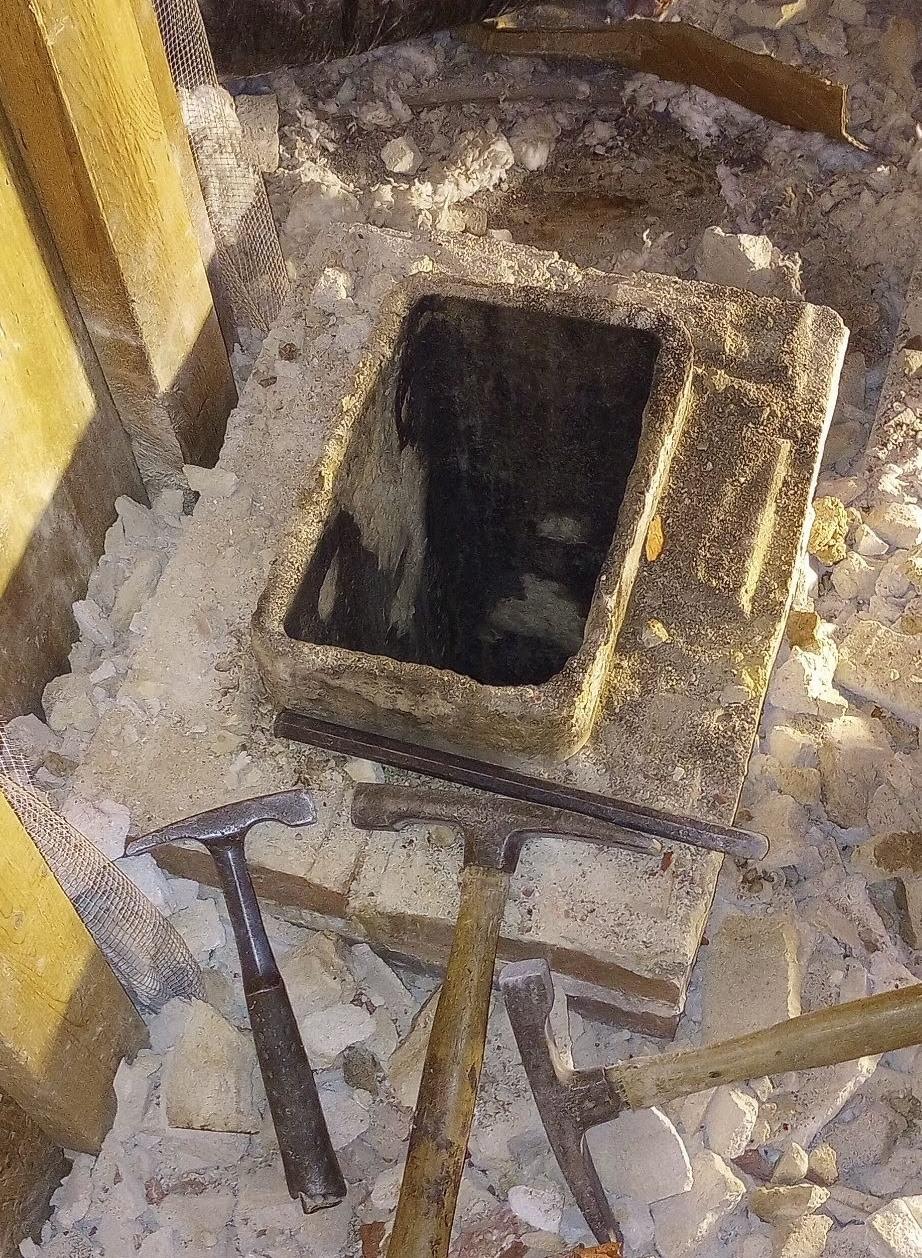 Removed chimney with tools laying around
